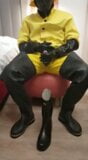 yellow rain gear and rubber boots snapshot 5