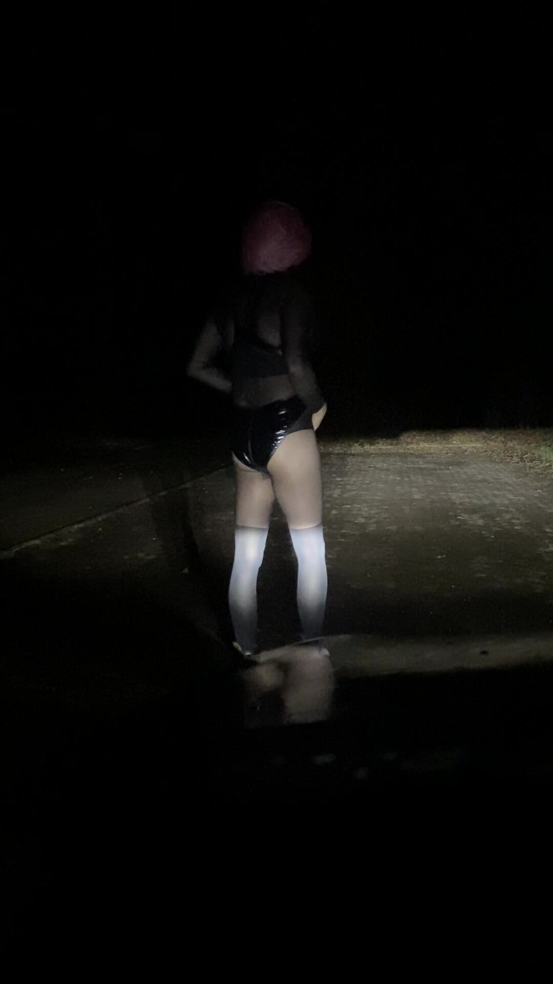 Sissy femboy risky outdoor at night in shiny bodysuit and nylon panythose