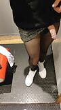 Black pantyhose in women's fitting room snapshot 1