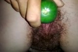 Cucumber in her pussy snapshot 9