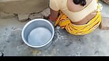 Woman near stove snapshot 1