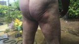 Naked gardening. Watering, muddy play and cold shower snapshot 19