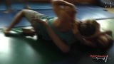 Headscissors in mixed wrestling snapshot 5