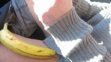 putting a rubber on a banana snapshot 1