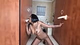 Indian girl fucking and sucking two suction cup dildos stuck to cupboards snapshot 2