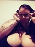 BBW with pigtails and huge tits playing with her breast snapshot 3