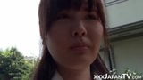 Japanese schoolgirl playing with her pussy over panties snapshot 6