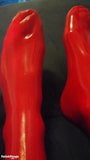 Shiny red latex rubber stockings closeup snapshot 1