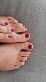 Red nails and beautiful feet snapshot 3