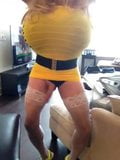 Busty smoking crossdresser in yellow snapshot 12