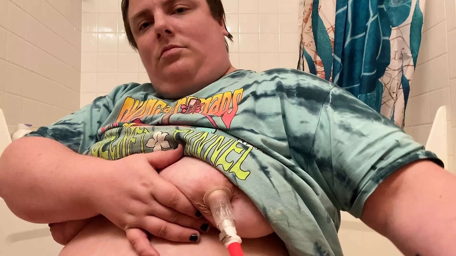 ftm guy pulls on pumped nipples