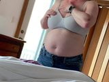 Big belly mature putting on bra snapshot 3