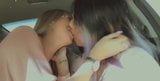 Two sexy Asian chick kissing snapshot 2