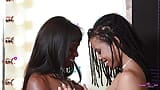 A simple photoshoot turns into a lesbian action between two black babes with small tits snapshot 13