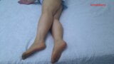 Anna is on the bed, showing off in pantyhose. snapshot 8