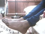 Rubbing lotion on my feet snapshot 1