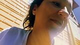 Britanny has a squirt in the patio of her house snapshot 3