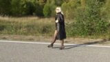 Walking on the road in a mini dress snapshot 1