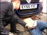 Young car mechanic servicing older gay businessman snapshot 6