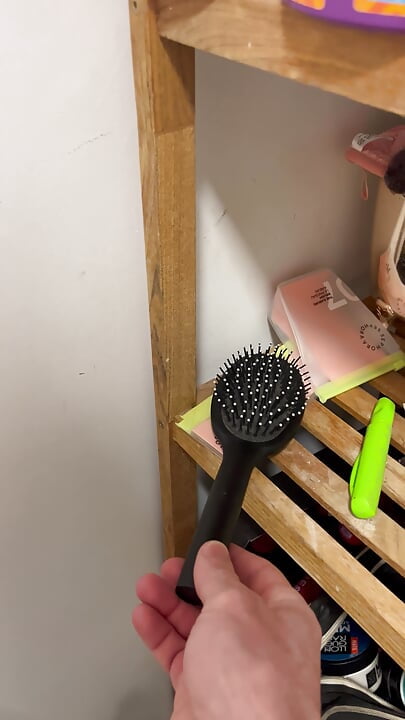 My roommate's brush and towel