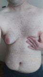 Chico gordito muestra sus grandes tetas peludas snapshot 9