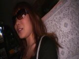 Nasty Japanese girl rubs her clit before peeing in a bar toilet snapshot 6