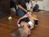 blonde cheerleader hogtied and duct tape gagged snapshot 3