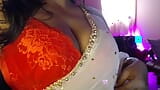 Desi sexy Bhabhi shows big boobs through bra and does nipple rubbing. snapshot 5