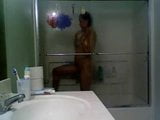 Girl in glass taking a shower snapshot 18