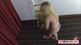 Two blondes play a strip game of throw the balls snapshot 11