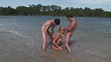 Perfect blond nasty mermaid have sex fun with two friends on beach and lake. snapshot 4