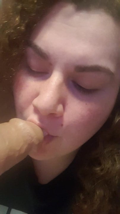 woman sucking dildo