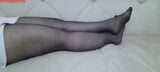 From another point of view, Anna's black pantyhose, legs and feet. snapshot 9