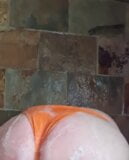 Another quick shower in sexy orange bikini snapshot 7