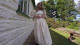 Wedding dress, boots and stockings outdoors snapshot 1