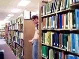 Guy Stroking In University Library snapshot 6