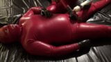 Latex Danielle in catsuit have latex masturbating games with his slave snapshot 11