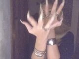 Russian girl's long claws snapshot 2