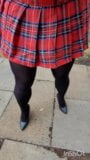 crossdresser in tartan skirt opaque tights and heels plays and cums in public snapshot 5