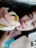 Filipina Julie blowjob with a banana snapshot 6