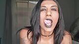 Desi slut dirty talking while playing, displaying her tongue and soft lips snapshot 1