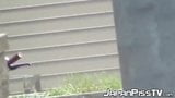 Japanese brunette squats while pissing outdoors snapshot 15