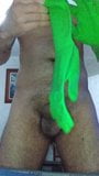 Putting on Green rubber gloves snapshot 3