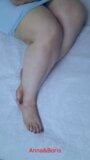 Another perspective, Anna looks beautiful in bed with bare feet. Do you think it's beautiful? snapshot 1