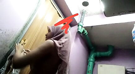 Azizah plays with her tits