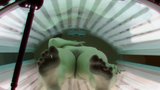 Blonde Hottie Secretely Masturbating in Public Solarium snapshot 4