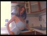 巨乳熟女がキッチンカウンターでオナニー snapshot 1