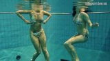 Girls Andrea and Monica stripping one another underwater snapshot 7