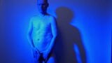 Kudoslong nude in a blue light playing with his flaccid cock snapshot 2