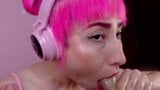 Pink haired girl strokes and sucks a long dick snapshot 14